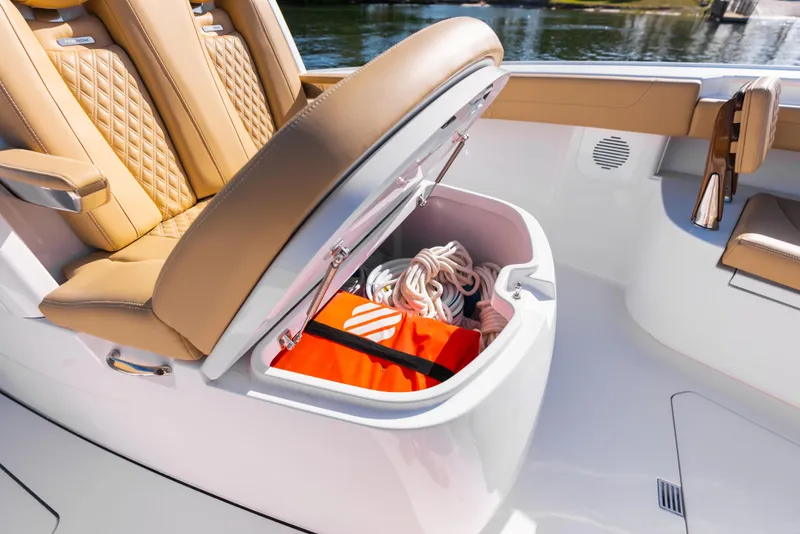 Slide: The Image of 2026 Phenom 34 Center Console boat storage with ropes and life jacket. - 26
