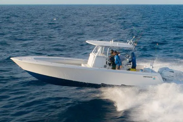 Slide: The Image of Manufacturer Provided Image: Contender 32 ST 2026 boat cruising on open sea. - 2