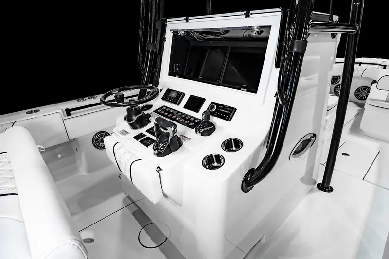 Slide: The Image of Manufacturer Provided Image: 2026 Contender 32 ST boat cockpit with modern controls and sleek design. - 6