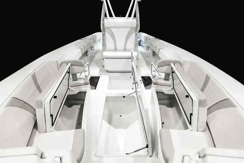 Slide: The Image of Manufacturer Provided Image: 2026 Contender 32 ST boat interior with sleek seating and storage compartments. - 5