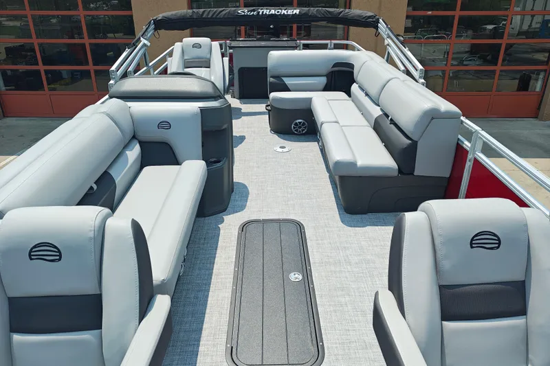 Slide: The Image of 2026 Sun Tracker Sportfish 24 XP3 pontoon boat interior with spacious seating and modern design. - 4