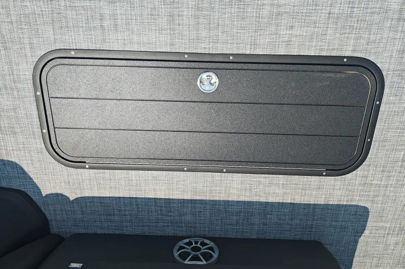 Slide: The Image of Storage compartment on 2026 Sun Tracker Sportfish 24 XP3 boat interior. - 24