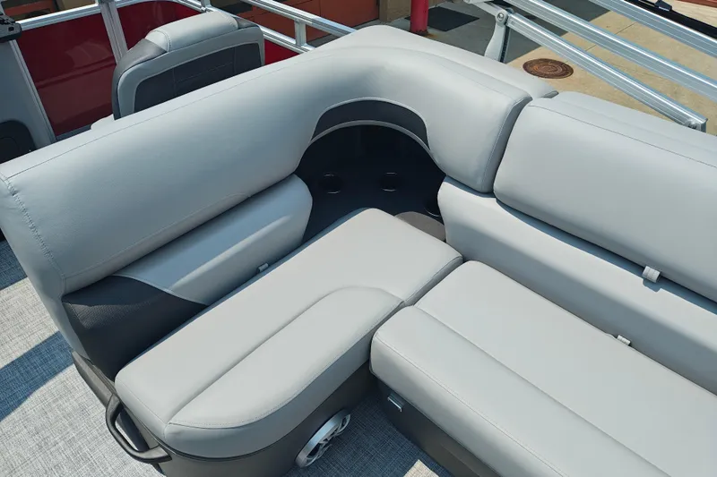 Slide: The Image of Luxurious seating on 2026 Sun Tracker Sportfish 24 XP3 pontoon boat, featuring sleek gray upholstery. - 8