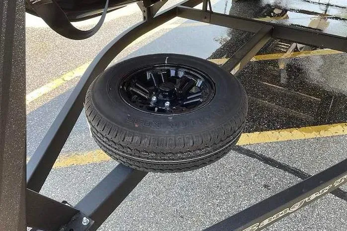 Slide: The Image of Spare tire mounted on a Ranger 220F trailer, 2026 model. - 11