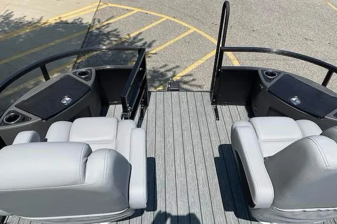 Slide: The Image of 2026 Ranger 220F boat interior with gray seating and sleek design. - 9