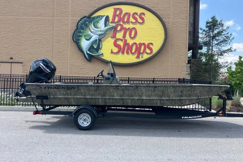 The Image of 2026 Tracker Grizzly 2072 CC boat on trailer at Bass Pro Shops. - 0