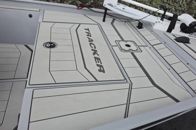 Slide: The Image of 2026 Tracker Bass Tracker Classic CC boat deck with sleek design and branding. - 6