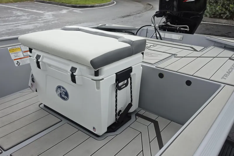 Slide: The Image of 2026 Tracker Bass Tracker Classic CC boat interior with cooler seat on deck. - 10