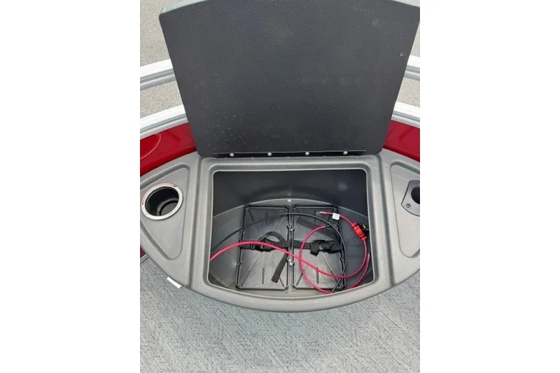 Slide: The Image of Open storage compartment on 2026 Sun Tracker Fishin' Barge 22 XP3 boat. - 18