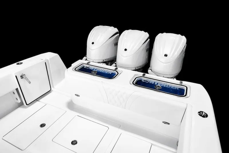 Slide: The Image of Manufacturer Provided Image: 2026 Contender 35 ST boat with triple Yamaha outboard engines, sleek white design. - 8