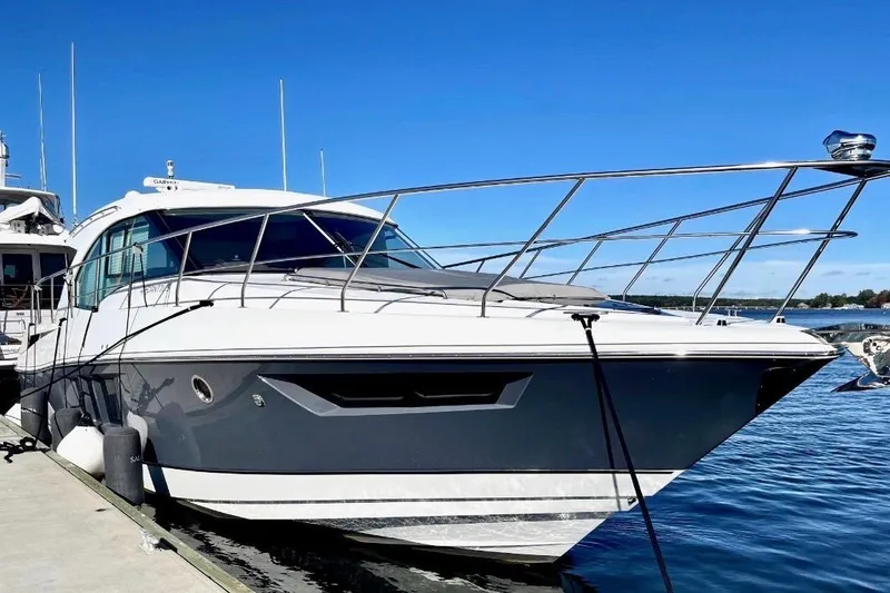 Slide: The Image of 2018 Cruisers Yachts 45 Cantius docked, showcasing sleek design and modern features. - 3