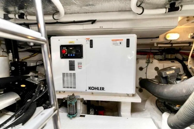 Slide: The Image of Engine room of 2018 Cruisers Yachts 45 Cantius with Kohler generator. - 16