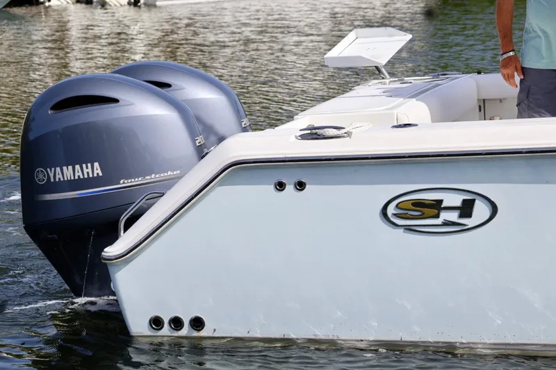 Slide: The Image of 2018 Sea Hunt Gamefish 27 Coffin Box with Yamaha engines on water. - 4