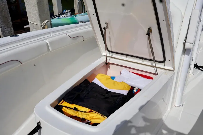 Slide: The Image of Open storage compartment on 2018 Sea Hunt Gamefish 27 Coffin Box boat. - 20
