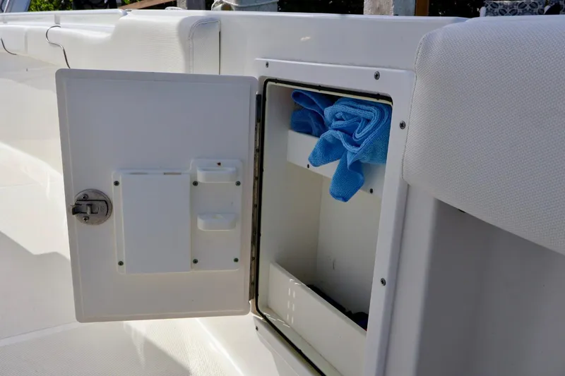 Slide: The Image of Open storage compartment on 2018 Sea Hunt Gamefish 27 Coffin Box boat. - 15