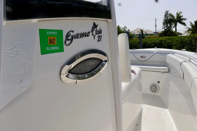 Slide: The Image of 2018 Sea Hunt Gamefish 27 Coffin Box boat interior with Florida registration sticker. - 17