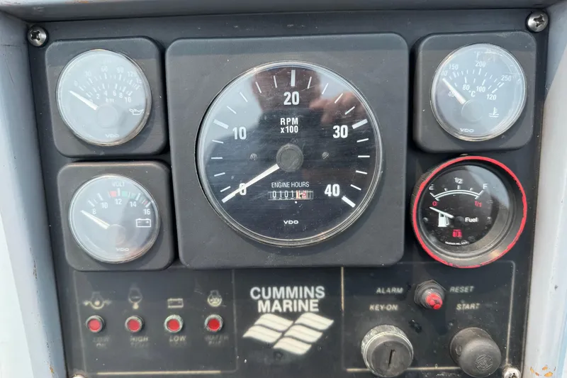 Slide: The Image of Control panel of a 1996 Willard Marine Sea Force 730 with Cummins Marine gauges. - 20