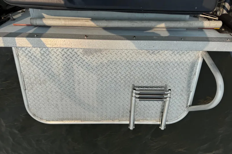 Slide: The Image of Metal platform with ladder on 1996 Willard Marine Sea Force 730 boat. - 9