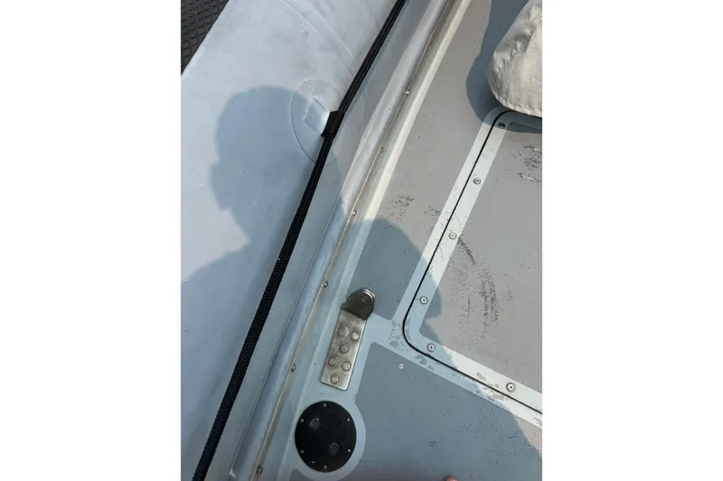 Slide: The Image of Close-up of 1996 Willard Marine Sea Force 730 boat deck details. - 28