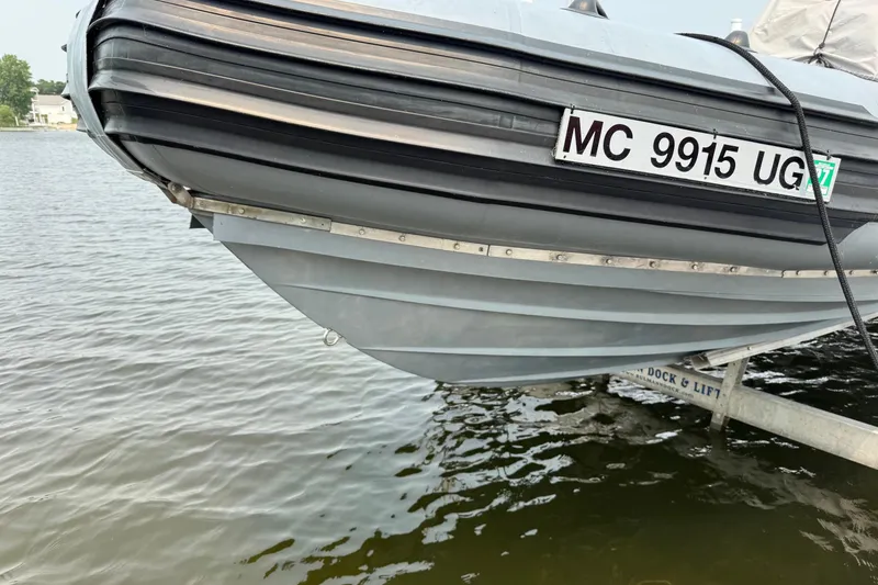 Slide: The Image of Willard Marine Sea Force 730 boat on trailer, close-up of bow and registration number. - 3