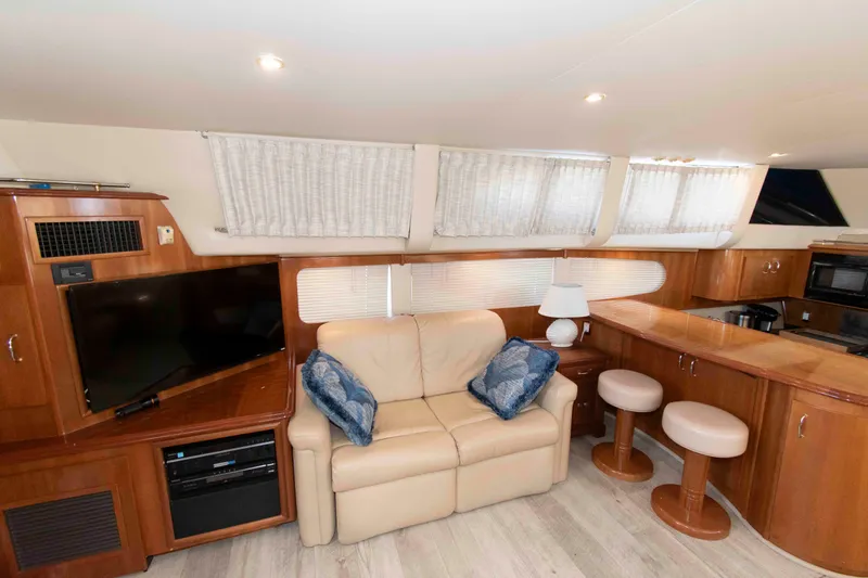 Slide: The Image of Luxurious interior of 2005 Carver 466 Motor Yacht with leather seating and modern amenities. - 15