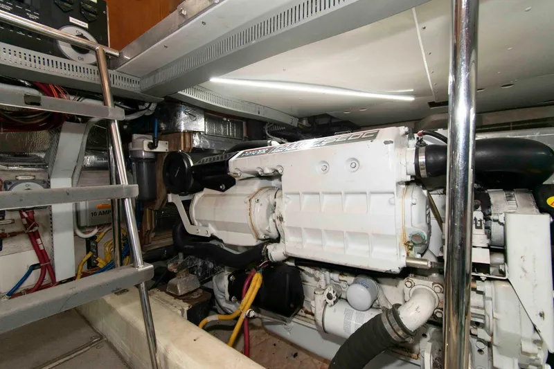 Slide: The Image of Engine room of 2005 Carver 466 Motor Yacht, showcasing machinery and equipment. - 27