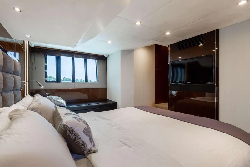Slide: The Image of Luxurious bedroom interior of 2012 Princess 60 yacht with modern decor and large windows. - 31