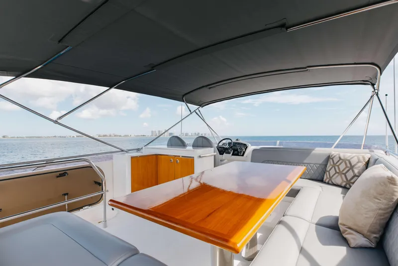 Slide: The Image of Luxurious 2012 Princess 60 yacht interior with elegant seating and ocean view. - 48