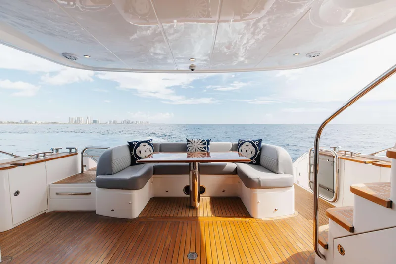Slide: The Image of Luxurious 2012 Princess 60 yacht deck with elegant seating and ocean view. - 14