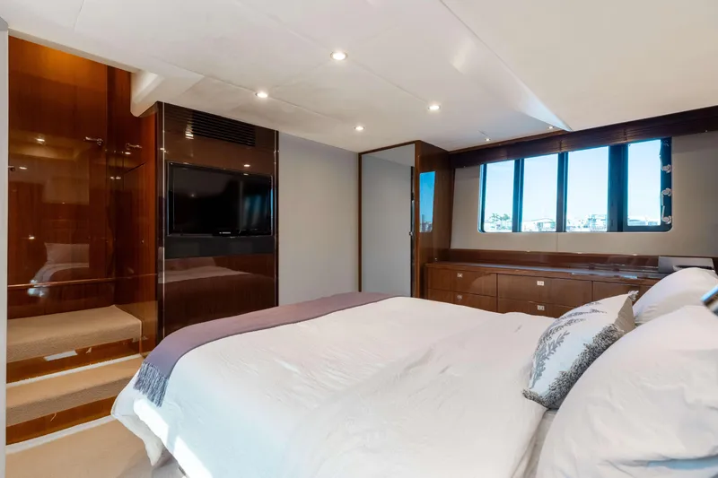 Slide: The Image of Luxurious bedroom interior of 2012 Princess 60 yacht with modern furnishings and natural light. - 30