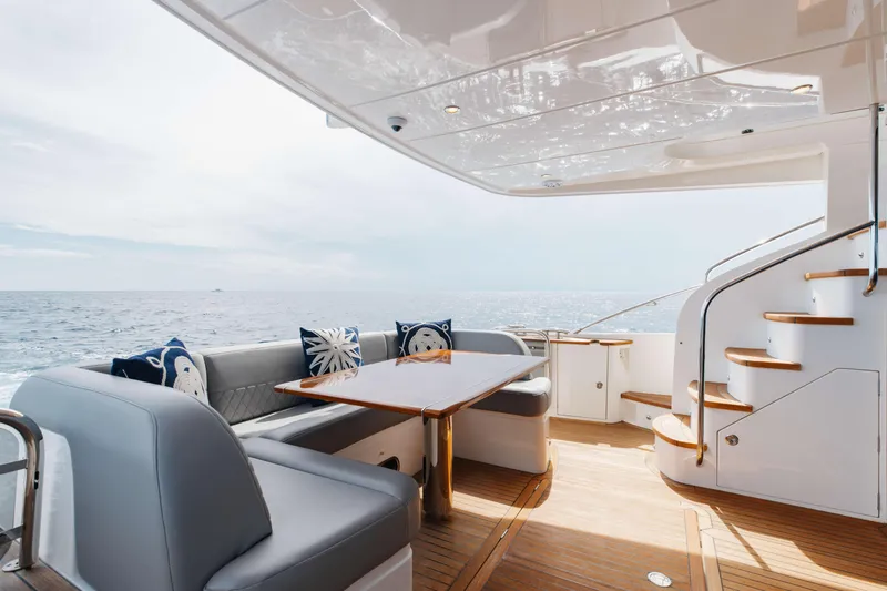 Slide: The Image of Luxurious 2012 Princess 60 yacht deck with elegant seating and ocean view. - 15
