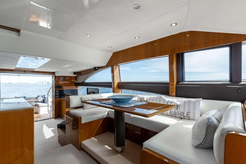 Slide: The Image of Luxurious interior of 2012 Princess 60 yacht with elegant seating and ocean view. - 24