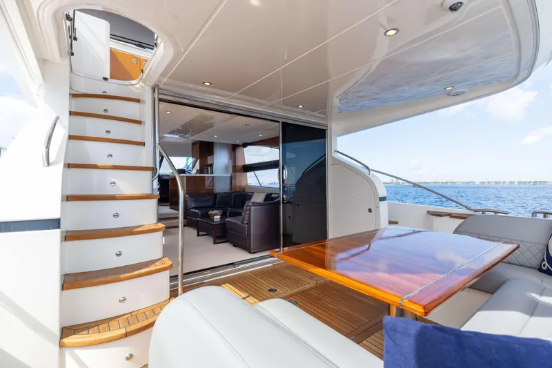 Slide: The Image of Luxurious 2012 Princess 60 yacht interior with elegant seating and ocean view. - 17