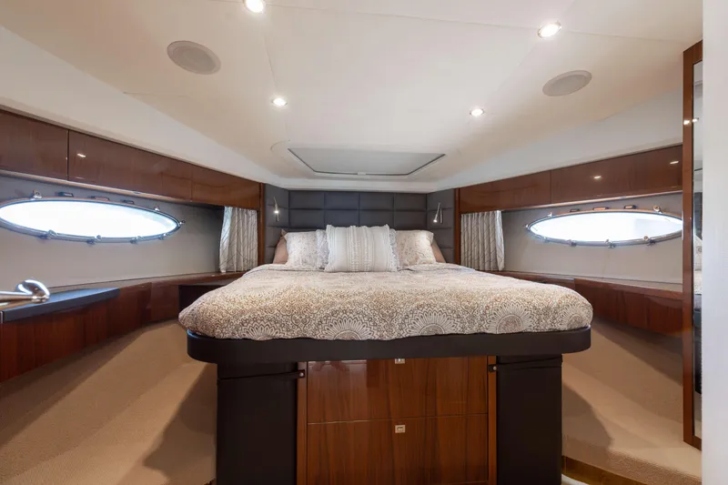 Slide: The Image of Luxurious bedroom interior of 2012 Princess 60 yacht with elegant wood finishes. - 34