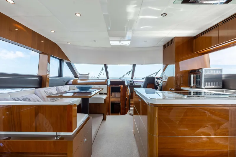 Slide: The Image of Luxurious interior of 2012 Princess 60 yacht with modern kitchen and seating area. - 25