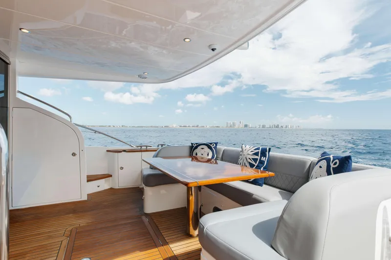 Slide: The Image of Luxurious 2012 Princess 60 yacht deck with seating, table, and ocean view. - 16