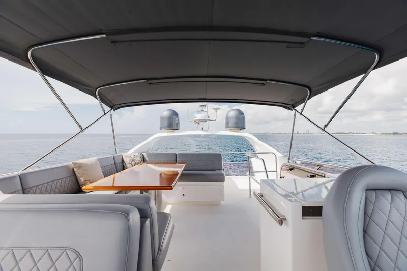 Slide: The Image of Luxurious 2012 Princess 60 yacht interior with elegant seating and ocean view. - 41
