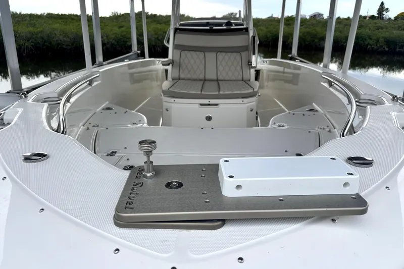 Slide: The Image of 2022 Boston Whaler 250 Dauntless boat interior with seating and sleek design. - 20