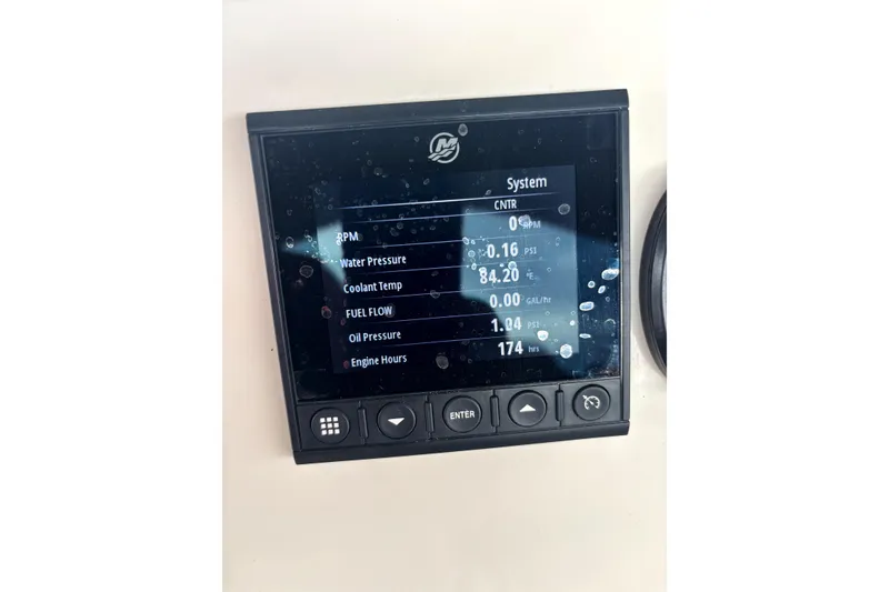 Slide: The Image of Digital display panel on a 2022 Boston Whaler 250 Dauntless boat showing system metrics. - 36