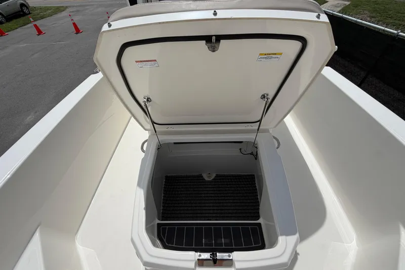 Slide: The Image of Open storage compartment on a 2022 Boston Whaler 250 Dauntless boat. - 43