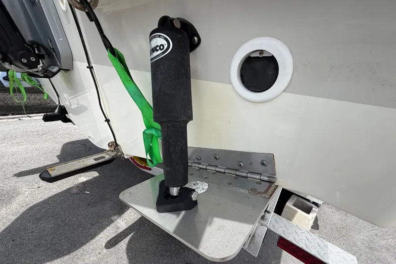 Slide: The Image of 2022 Boston Whaler 250 Dauntless boat with trim tab and hydraulic actuator. - 5