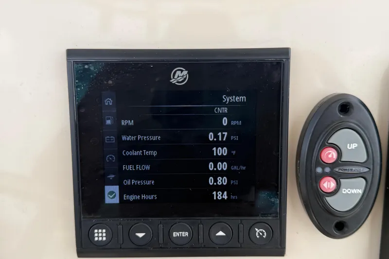 Slide: The Image of Dashboard display of a 2022 Boston Whaler 250 Dauntless boat showing system metrics. - 22