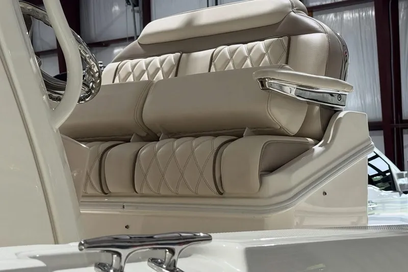 Slide: The Image of Luxurious seating on 2022 Boston Whaler 250 Dauntless boat, featuring elegant diamond stitching. - 14