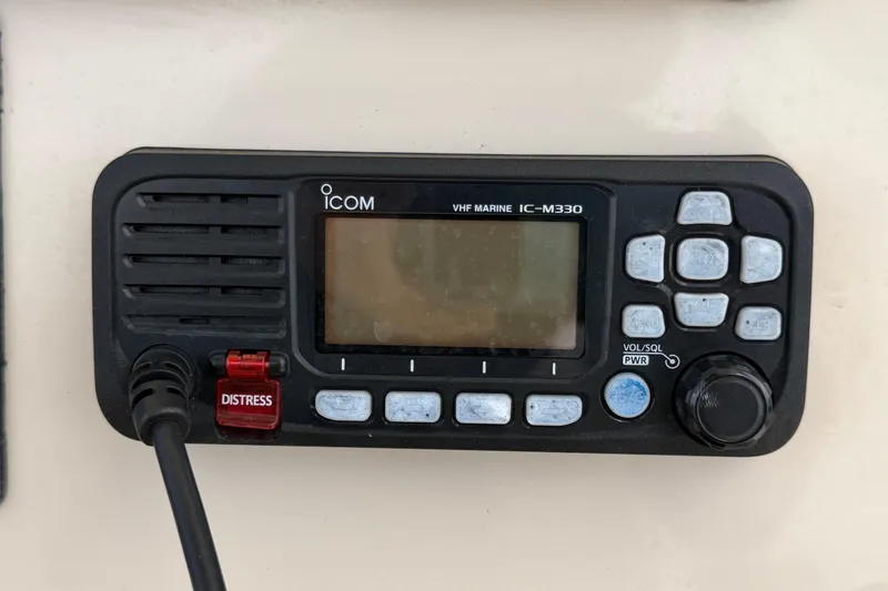 Slide: The Image of Icom VHF Marine IC-M330 radio on 2022 Boston Whaler 250 Dauntless boat. - 26