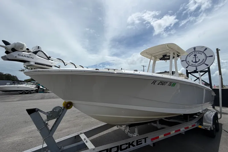 Slide: The Image of 2022 Boston Whaler 250 Dauntless boat on trailer, equipped with Garmin technology. - 9
