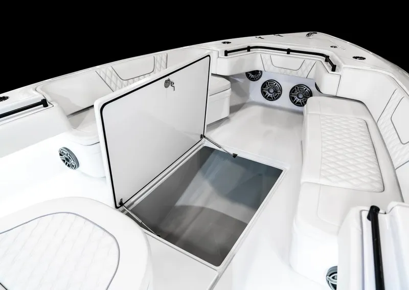 Slide: The Image of Manufacturer Provided Image: Interior of 2026 Contender 44 CB with storage and speakers. - 5