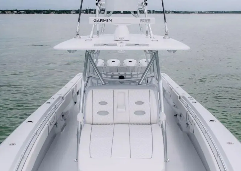 Slide: The Image of Manufacturer Provided Image: Contender 44 CB 2026 boat on calm water. - 6