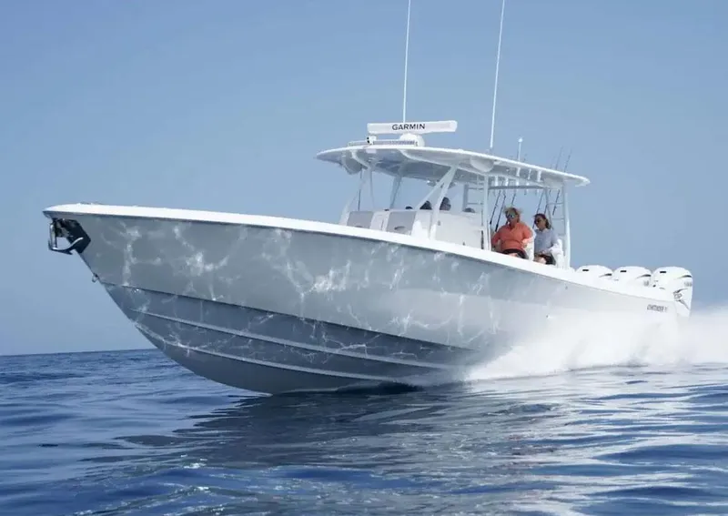 Slide: The Image of Manufacturer Provided Image: Contender 44 CB 2026 cruising swiftly on open sea. - 2