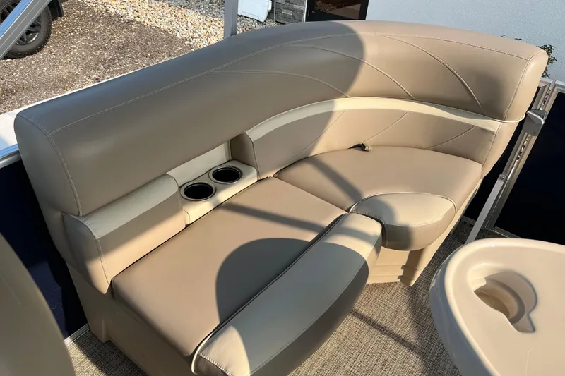 Slide: The Image of Luxurious seating on 2019 SunChaser Geneva Cruise 20 LR pontoon boat with cup holders. - 6