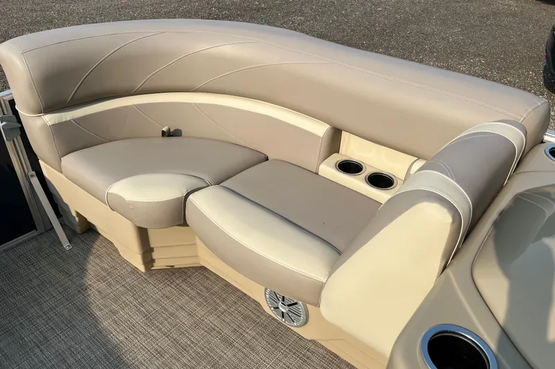 Slide: The Image of Luxurious seating on 2019 SunChaser Geneva Cruise 20 LR pontoon boat with cup holders. - 11